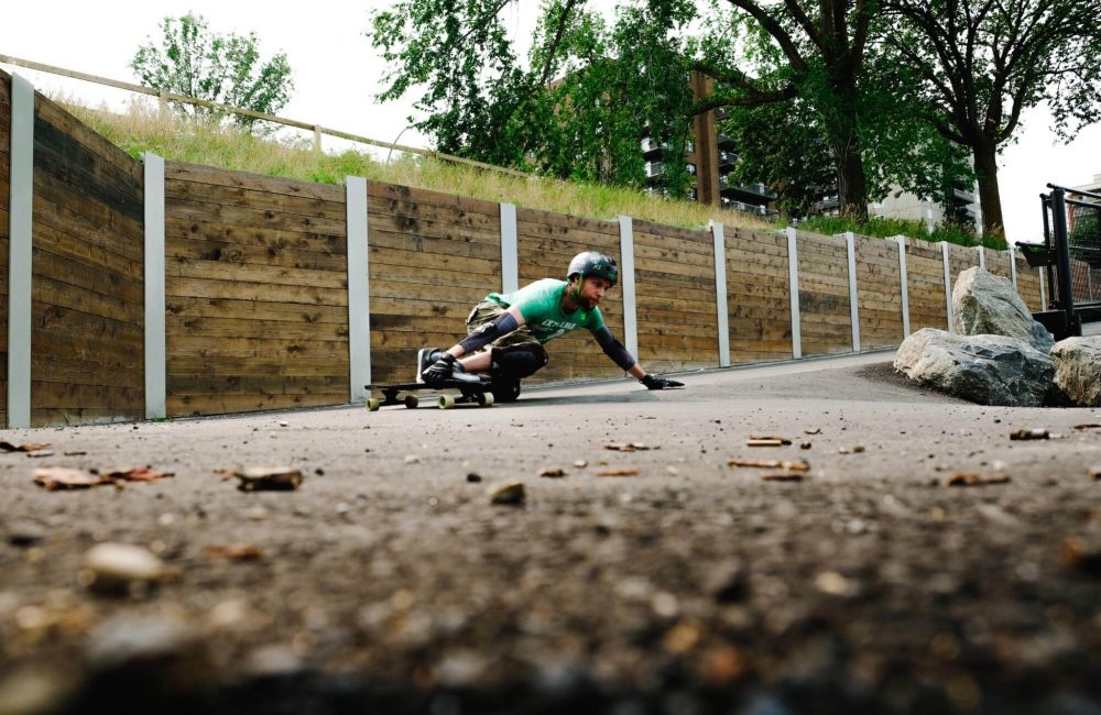 skater-full-pads-hill-bombing-scary-skateboarder-skateboarding